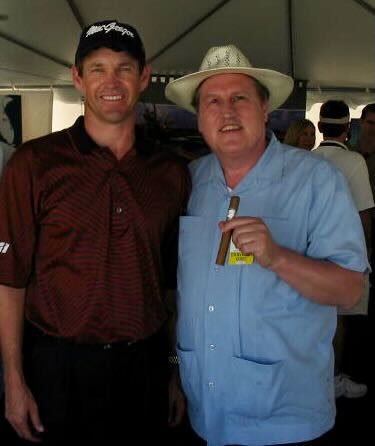 Joe with a guest at an evening reception