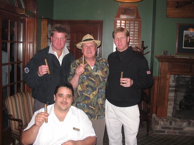 Joe, Jorge, and a golfer at a tournament