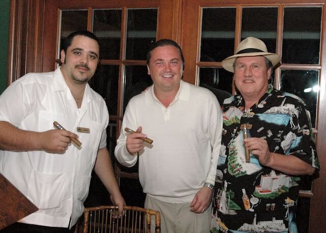 Two friends with a cigar box