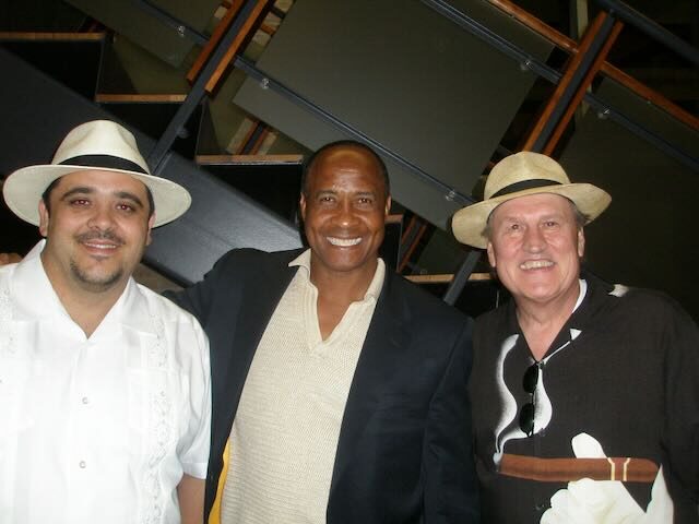 Joe and a guest with cigars