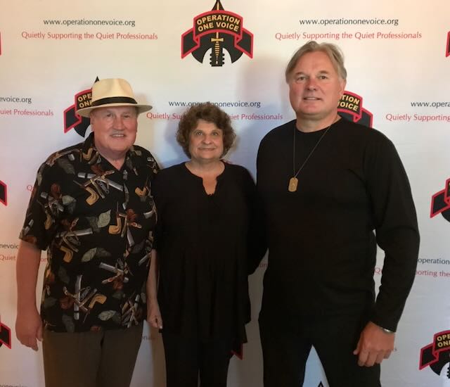 Joe and Elaine with a guest at a charity event