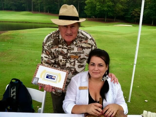 Joe with golfers on the course