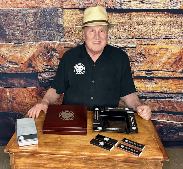 Joe Sweigart at an event with his cigar collection
